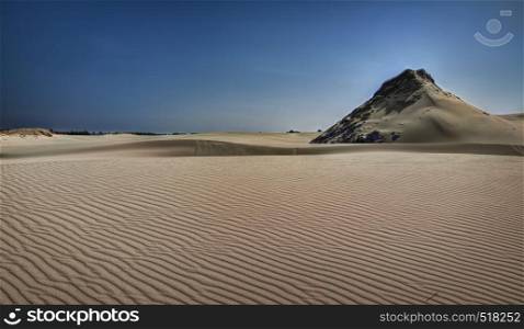 Spring midday. Moving sand dunes at Slowinski National Park near Leba, Pomeranian Voivodeship, Poland.