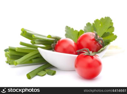 Spring onions and cherry tomato in bowl isolated on white background cutout