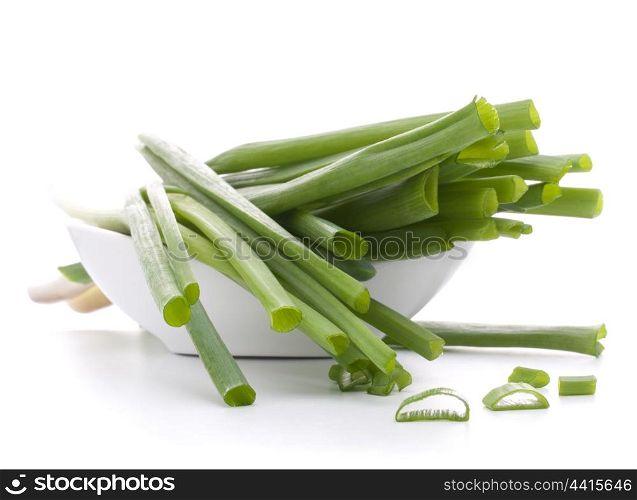 Spring onions in bowl isolated on white background cutout