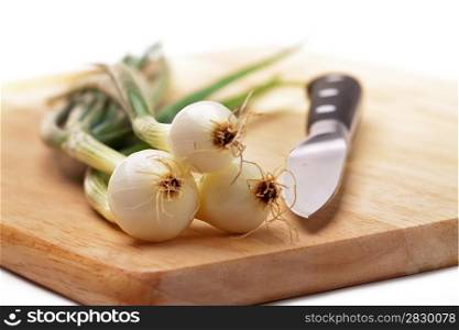 Spring onions. Three bulbs spring onions
