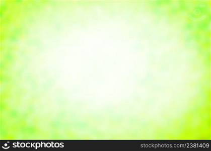 Spring or summer abstract nature background. View with copy space. Green bokeh nature defocus blur background.