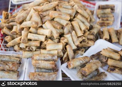 Spring rolls and traditional lao food at the Pha That Luang Festival in the city of vientiane in Laos in the southeastasia.. LAOS VIENTIANE PHA THAT LUANG FESTIVAL LAO FOOD