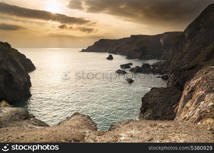 Spring sunset at high tide at Kynance Cove. Spring sunset at high tide at Kynance Cove Cornwall England