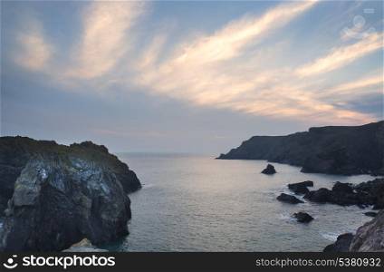 Spring sunset at high tide at Kynance Cove. Spring sunset at high tide at Kynance Cove Cornwall England