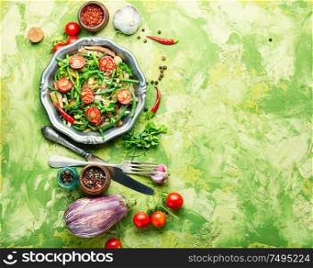 Spring vegetable salad.Salad with asparagus beans, tomato, eggplant and asparagus. Salad with asparagus beans