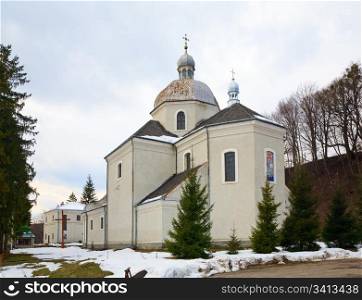 Spring view of old Pidhirtsi St. Onufriya Church (Annunciation Monastery Order of St. Basil the Great, Ukraine, Lvivska Region, built in 1726-1750)