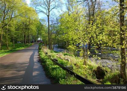 Springtime view at a country road by riverside in the province Smaland Sweden