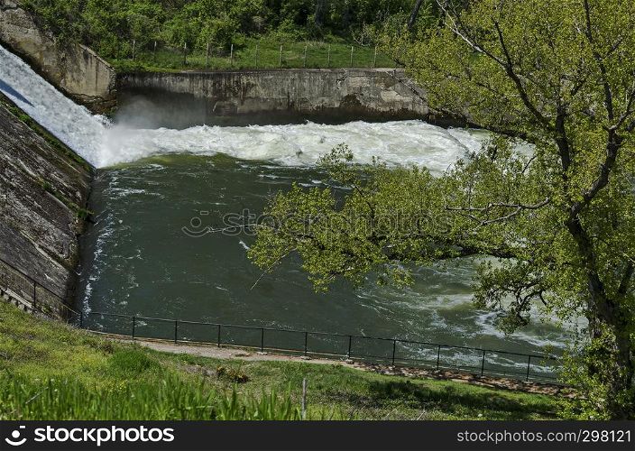 Springtime view of spillway in the dam of resort village Pancharevo, Sofia, Bulgaria