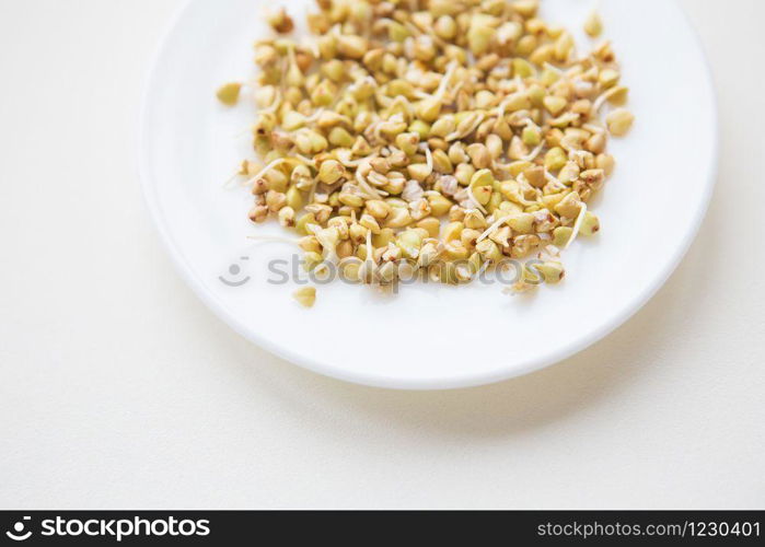 sprouted buckwheat grains on a plate, healthy food, fitness, sports, diet.. sprouted buckwheat grains on a plate, healthy food, fitness, sports, diet