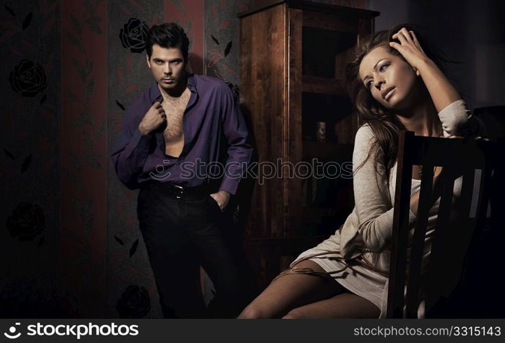 Squabbled couple in stylish apartment