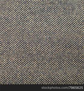 square background from green and brown tweed fabric close up