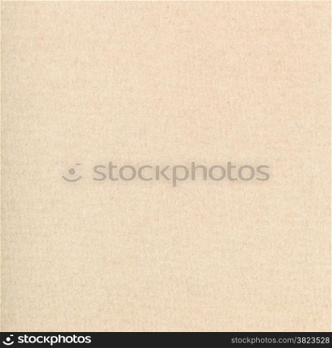 square background from light brown color textured paper close up