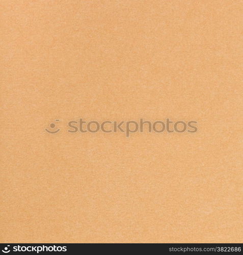 square background from sheet of light brown pastel paper close up