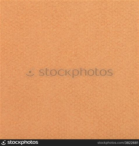 square background from sheet of warm brown pastel paper close up