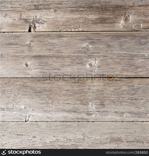 square background of old grungy light brown wooden planks