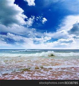 Square bright seascape with white clouds, blue sky and beautiful sea surf.
