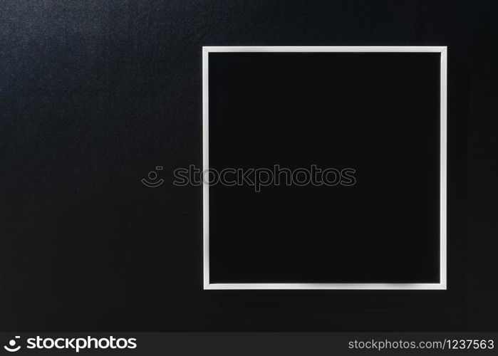 Square empty for copy space text message in black wooden background.