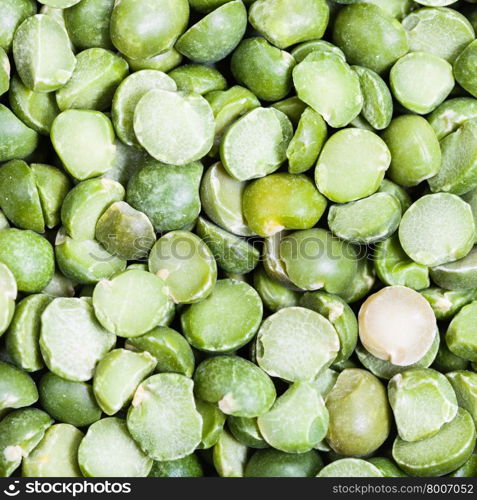 square food background - uncooked green split peas