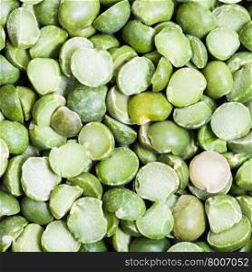 square food background - uncooked green split peas