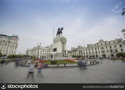 square in the center of which stands a monument to a man on a horse. Lima, Peru.. Lima, Peru.