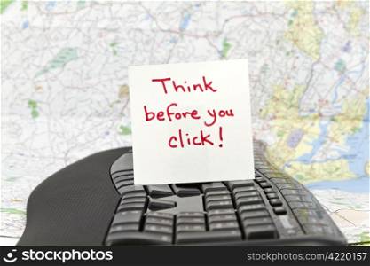 "Square note paper with phrase, "Think before you click!" as a digital age, web safety rule. "