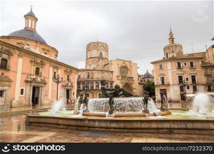 Square of Saint Mary&rsquo;s and fountain Rio Turia in Valencia in a beautiful summer day, Spain