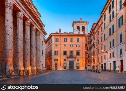 Square Piazza di Pietra in Rome, Italy.. Square Piazza di Pietra, located in the historic center of Rome, surviving side colonnade of the Temple of Hadrian on the left, in the morning, Italy.