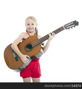 square picture of young happy girl in red standing with guitar against white background