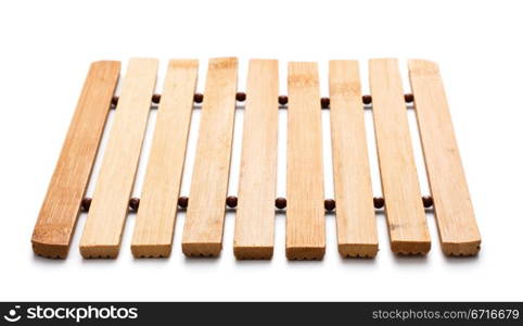 square, wooden trivet isolated on white background