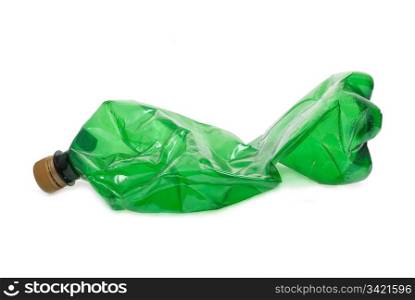 Squashed plastic green bottle