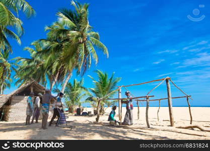 SRI LANKA - Mach 23: Local fishermen pull a fishing net from Indian Ocean on Mach 23, 2017 in Kosgoda, Sri Lanka. Fishing in Sri Lanka is the way they earn their living.