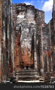 Sri Lanka travel and landmarks - ancient city of Polonnaruwa, UNESCO World Heritage Site. Buddha statue carved in the rock, Lankatilaka Vihara temple. ancient city Polonnaruwa, Sri Lanka.