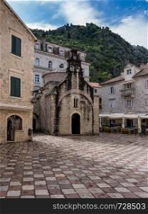 St Luke's Church on pedestrian streets of old town Kotor in Montenegro. Narrow streets in the Old Town of Kotor in Montenegro