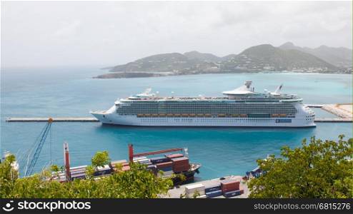 ST MARTIN, ANTILLES - JULY 18, 2013: Cruise ship Freedom of the Seas, anchored at St. Martin on July 18, 2013. Passengers have to be tendered to the island for day excursions. July 18, 2013