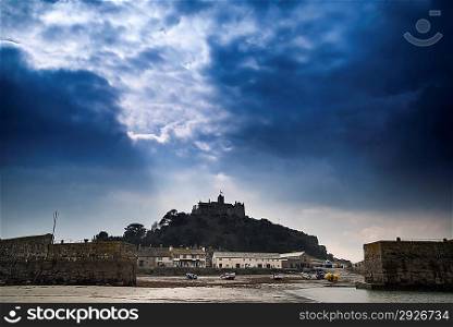 St Michael&acute;s Mount harbour Marazion landscape during stormy Spring morning Cornwall England