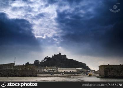 St Michael&rsquo;s Mount harbour Marazion landscape during stormy Spring morning Cornwall England