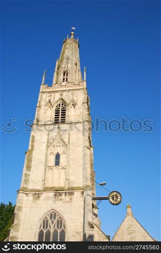 St Nicholas church in Gloucester, England (blue sky background)