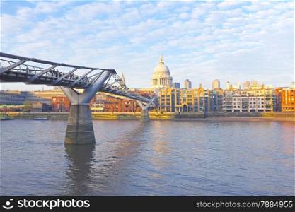 St. Paul&rsquo;s cathedral with the Millennium bridge in London UK