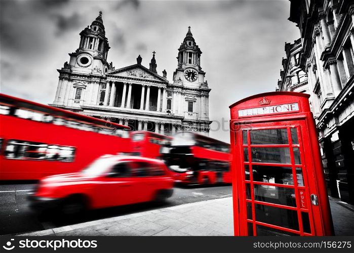 St Paul?s Cathedral facade, red bus, taxi cab and red telephone booth. Symbols of London, the UK. Black and white. London, the UK. St Paul?s Cathedral, red bus, taxi cab and red telephone booth.