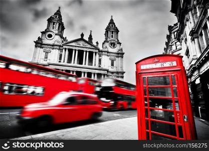 St Paul?s Cathedral facade, red bus, taxi cab and red telephone booth. Symbols of London, the UK. Black and white. London, the UK. St Paul?s Cathedral, red bus, taxi cab and red telephone booth.