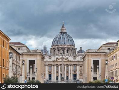 St. Peter&rsquo;s cathedral in Vatican view from Via della Conciliazione (Road of the Conciliation) in Rome, Italy