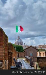 St. Peter’s cathedral view from Castle of the Holy Angel  Castel Sant’Angelo  and flag of Italy in Rome