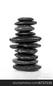 stability and balance. tower of wet pebbles.