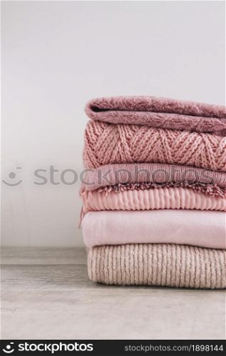 stack knitted sweaters floor2. Resolution and high quality beautiful photo. stack knitted sweaters floor2. High quality beautiful photo concept