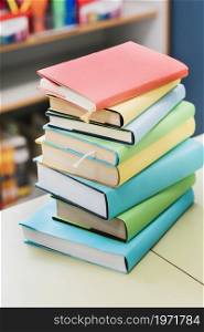 stack multicolored books table. High resolution photo. stack multicolored books table. High quality photo