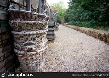 stack of baskets along a path