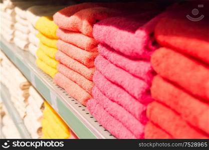 Stack of bath towels on retail shop shelf