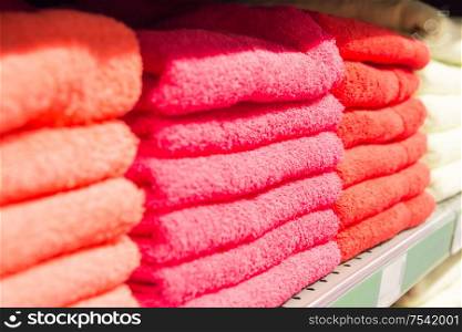 Stack of bath towels on retail shop shelf