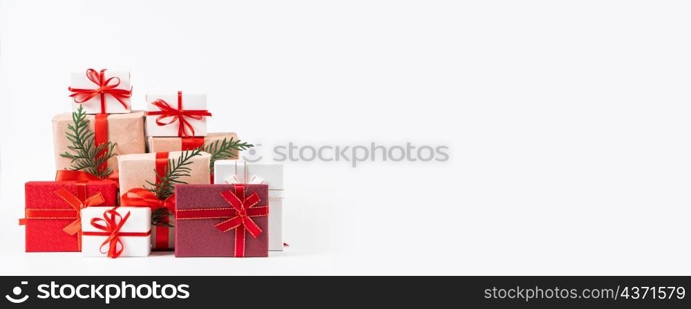 Stack of beautiful gift boxes on a white background. Festive New Year concept.. Stack of beautiful gift boxes on white background. Festive New Year concept.