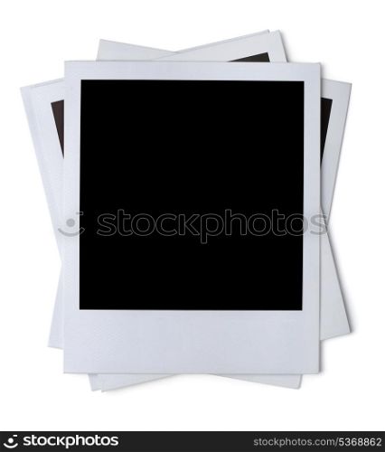 Stack of blank paper photo frames isolated on white